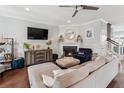 Cozy living room with a fireplace, modern furniture, and stylish decor at 1614 Prince Edward St, Mount Pleasant, SC 29466