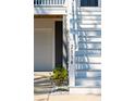 Close-up of the house number on a white post beside the stairs leading to the entrance at 2514 Bullock Guard Dr, Johns Island, SC 29455