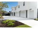 Spacious three-car garage with ample parking and landscaped surroundings at 509 Seven Farms Dr, Charleston, SC 29492