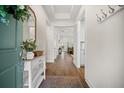 Welcoming foyer with hardwood floors, neutral walls, and stylish decor at 2014 Barn Swallow Rd, Summerville, SC 29483