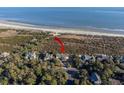 Coastal home with beach access nestled amongst trees; a beautiful island setting at 2238 Catesbys Blf, Seabrook Island, SC 29455