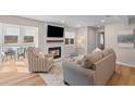 Cozy living room featuring a fireplace, wood floors, and neutral tones at 274 Alexandra Dr # 14, Mount Pleasant, SC 29464