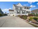 Charming home with a well-manicured lawn and long driveway with space for multiple cars at 625 Sienna Way, Summerville, SC 29486