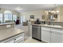 Bright kitchen overlooking the living area, complete with stainless steel appliances and ample counter space at 138 Golfview Ln, Summerville, SC 29485