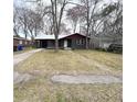 Charming single-story home featuring a carport, neat lawn, and a welcoming front entrance at 5056 Butler St, North Charleston, SC 29406