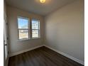 Bright bedroom with wood flooring, double windows and a ceiling light fixture at 5122 Double Eagle, Summerville, SC 29485