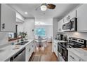 Bright kitchen with white countertops and updated appliances at 87 Ashley Hall Plantation Rd # 108, Charleston, SC 29407