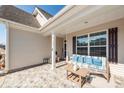 Welcoming front porch with comfortable seating and decorative elements at 121 Lakelyn Rd, Moncks Corner, SC 29461