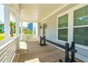 Inviting covered front porch with wood flooring and room to relax at 1796 Bolden Dr, Mount Pleasant, SC 29466