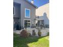Landscaped backyard with brick patio, BBQ grill and outdoor seating at 604 Ventura Pl, Mount Pleasant, SC 29464
