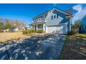 Lovely two-story home featuring an attached garage and well-maintained landscaping at 101 Back Creek Ct, Summerville, SC 29485
