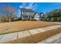 Beautiful two-story home featuring a well-manicured lawn and a welcoming facade at 101 Back Creek Ct, Summerville, SC 29485