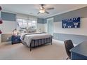 Comfortable bedroom showcasing two-tone walls, neutral carpeting, a ceiling fan, and decor at 110 Crosscut Ln, Summerville, SC 29486