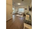 Comfortable living room with modern furnishings, open space and a glimpse into the rest of the home at 1252 Allusion Ln # 201, Mount Pleasant, SC 29466