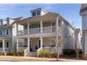Charming two-story home with double porches and well-maintained front yard at 1328 Upper Union Rd, Mount Pleasant, SC 29464