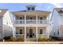 Beautiful two-story home with double porches and manicured landscaping at 1328 Upper Union Rd, Mount Pleasant, SC 29464