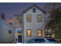 Inviting two-story home with a cozy front porch, perfect for enjoying the neighborhood view at 53 America St, Charleston, SC 29403