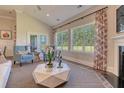 Inviting living room with ample natural light and elegant furnishings at 107 Crosscut Ln, Summerville, SC 29486