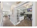 Bright office space with a large fish tank, modern decor, and seamless flow from other rooms in the house at 433 Cedarview Rd, Summerville, SC 29486