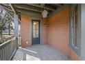Covered porch features stylish lighting and offers outdoor space for relaxation and enjoyment at 720 Island Park Dr # 104, Charleston, SC 29492