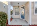 Inviting front entryway featuring a stylish blue door and decorative accents at 107 Diploma Dr, Ladson, SC 29485