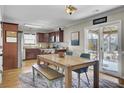 Inviting dining area with wood table, sliding door access, and a view of the backyard at 1562 Burnswick Dr, Johns Island, SC 29455