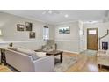 Bright living room featuring hardwood floors, neutral paint, and comfortable seating at 1562 Burnswick Dr, Johns Island, SC 29455