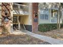 Close up of building entrance including stairwell, apartment numbers, and exterior lighting at 1600 Long Grove Dr # 1727, Mount Pleasant, SC 29464