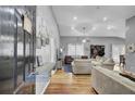 The interior showcases a bright, open living space with hardwood floors, and large windows at 223 Fox Field Rd, Walterboro, SC 29488
