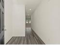 Inviting entryway with stylish gray wood floors, a white wall, and recessed lighting at 4368 Ocean Farm Dr, Summerville, SC 29485