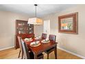 Traditional dining room featuring wood table, leather chairs and a decorative mirror at 471 Springfield Rd, Mount Pleasant, SC 29464