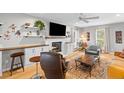 Inviting living room with a fireplace, stylish furniture, and ample natural light at 471 Springfield Rd, Mount Pleasant, SC 29464