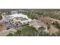 Beautiful aerial view showcasing the properties, lush surroundings, and the serene lake backdrop at 801 Balgrove Ct # 801, Mount Pleasant, SC 29466
