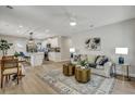 Bright, open-concept living space connecting kitchen, dining, and seating areas at 1744 Pinckney Park Dr, Charleston, SC 29407