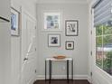 Bright foyer with modern decor and large window, creating a welcoming entrance at 2690 Park W Blvd, Mount Pleasant, SC 29466