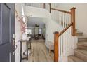 Entryway with wooden floors, a staircase, and views into the living room at 324 Saucer Rd, Summerville, SC 29486