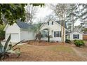 Beautiful single-Gathering home with palm trees, tidy landscaping, and white siding at 642 Bridlewood Ln, Mount Pleasant, SC 29466