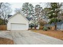 A traditional style home with a two-car garage and well-maintained landscaping at 642 Bridlewood Ln, Mount Pleasant, SC 29466