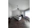 Bright living room with vaulted ceilings, fireplace, and ceiling fan at 7955 Timbercreek Ln # 1807, North Charleston, SC 29418