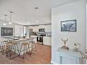 Kitchen featuring a large center island with bar stools and stainless steel appliances for a sleek and modern feel at 122 Liferidge Ct, Moncks Corner, SC 29461