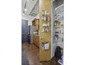 Organized pantry with wire shelves, showcasing ample storage space in the kitchen area at 150 Bee St # 312, Charleston, SC 29401