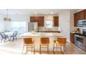 Bright kitchen with an island, stainless steel appliances, and a cozy breakfast nook at 1749 Towne St, Johns Island, SC 29455