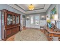 Elegant entryway with hardwood floors, beautiful furnishings, and lots of natural light at 225 Camber Rd, Huger, SC 29450