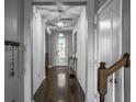 Inviting entryway with wood floors, pendant lighting, and a view of the front door at 265 Celestial Blvd, Summerville, SC 29486