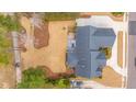 The aerial view shows a well-maintained roof, patio area, and lush landscaping around this attractive brick home at 105 Pine Valley Dr, Summerville, SC 29483