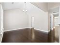 Bright living room with hardwood floors, vaulted ceiling, and neutral paint at 109 Arbor Oaks Dr, Summerville, SC 29485