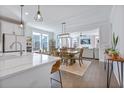 Open concept living space with dining area that features modern furnishings and lots of natural light at 170 Callibluff Dr, Summerville, SC 29486
