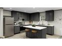 Modern kitchen featuring sleek gray cabinetry, stainless steel appliances, and a center island with bar stool seating at 626 Dennis Ridge Rd, Bonneau, SC 29431