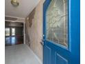 Inviting entryway with decorative wall accents and a view into the home's open floor plan at 8396 Waltham Rd, North Charleston, SC 29406