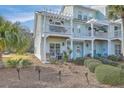 Charming coastal townhome featuring a private balcony and well-maintained landscaping at 1717 Brittlebush Ln, Johns Island, SC 29455